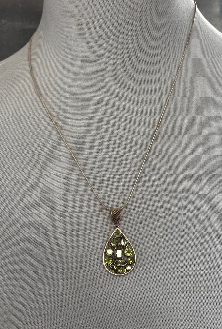 Peridot color gemstone teardrop pendant necklace, gold-tone metal setting